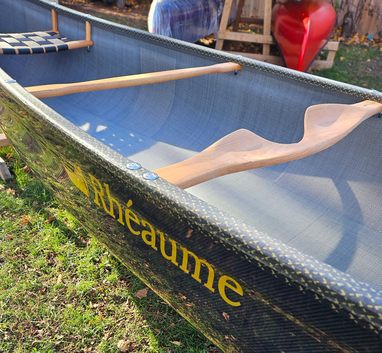 Rheaume Prospector 16'6" Carbon Canoe: Ideal for Diverse Paddling Needs: This canoe's design allows it to adapt to any type of situation, making it suitable for a variety of paddling styles and environments.
