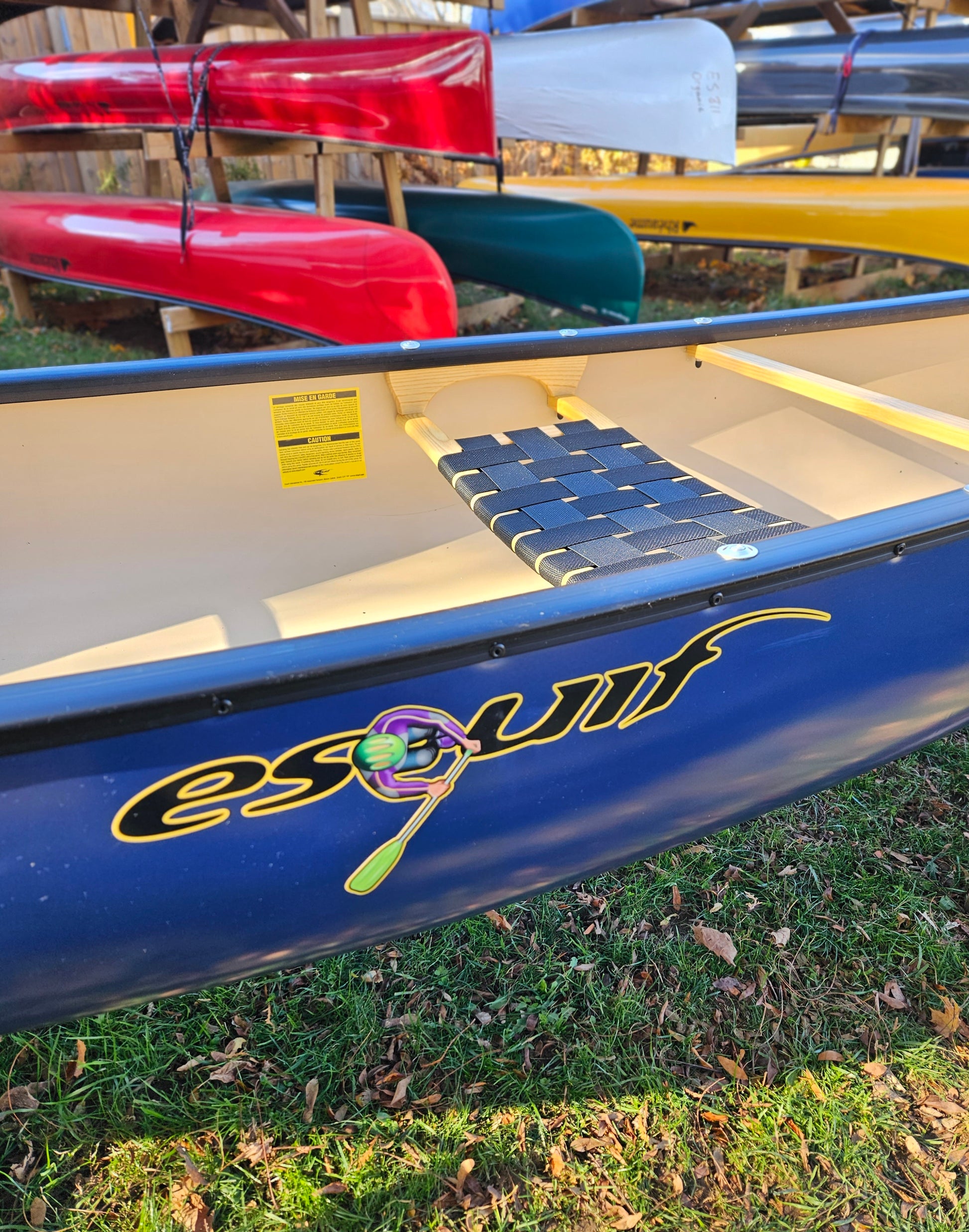Esquif Adirondack 12' T-Formex Canoe:  With its ideal capacity, the Adirondack is your perfect partner for solo adventures, whether you're carrying fishing tackle and overnight gear or accompanied by a smaller friend, human or furry. It's the go-to choice for intimate paddling experiences.