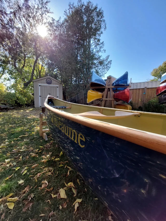 Rheaume Prospector 16'6" Kevlar Canoe with Wood Trim: the Prospector 16’6” stands out with its superior maneuverability, stability, and adaptability, making it a favored choice for camps, parks, schools, and individual enthusiasts alike.