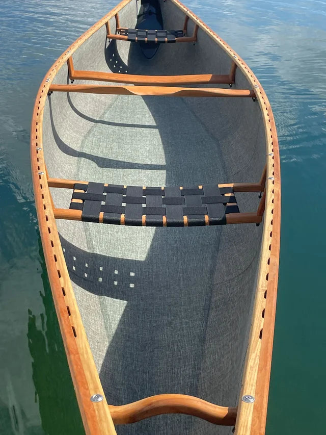 FOR SALE: Rheaume Nahanni 16'5 Kevlar Canoe with Wood Gunwales: A Fusion of Speed, Precision, and Beauty